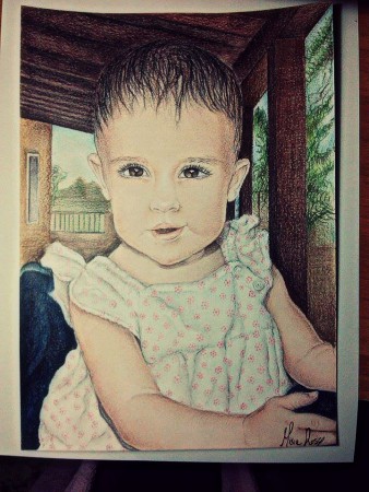 Ritratto. Mis: 21x31  Tecnica: pastelli colorati su carta